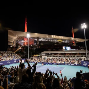 Miami Open tennis match at Hard Rock Stadium with crowd